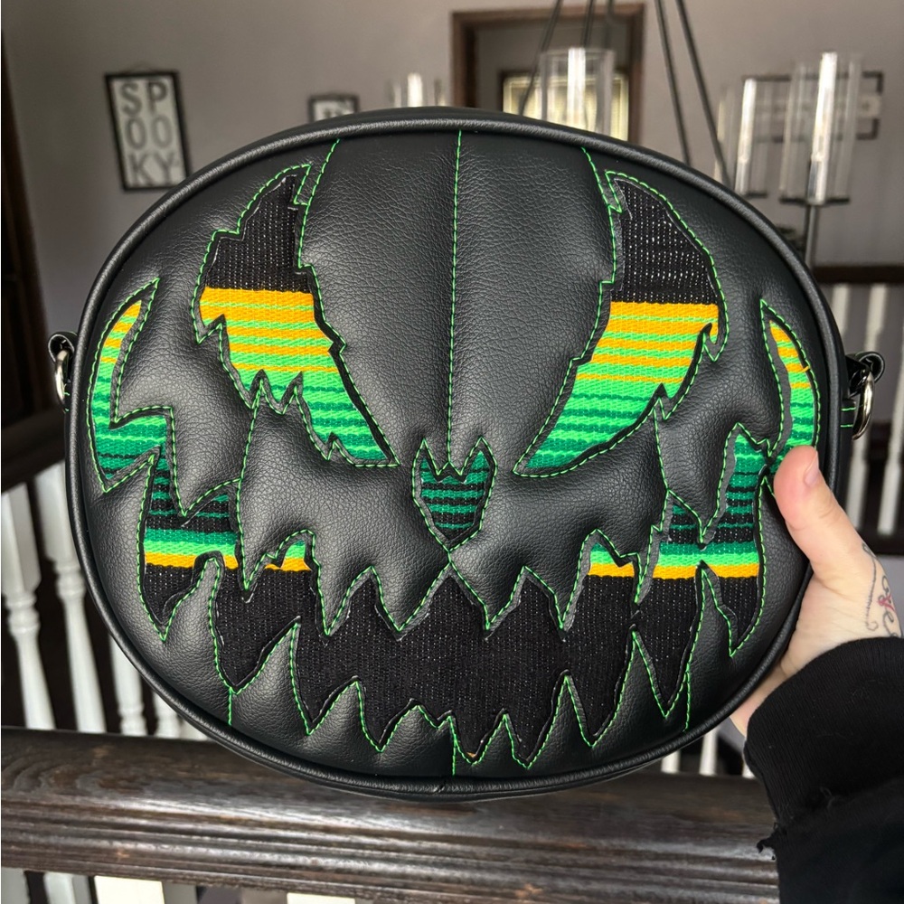Love pain and stitches serape bag